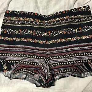 LOFT satiny ruffle side zip shorts